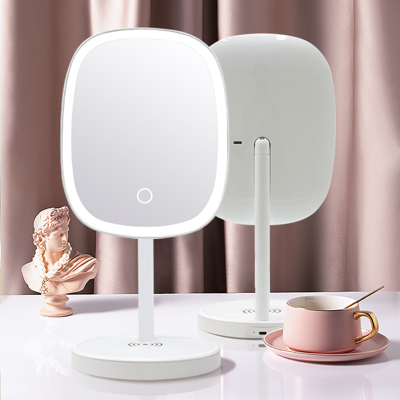 <a href="https://jojomirror.com/product/desktop-led-smartphone-wireless-charging-makeup-mirror/">Learn More </a>