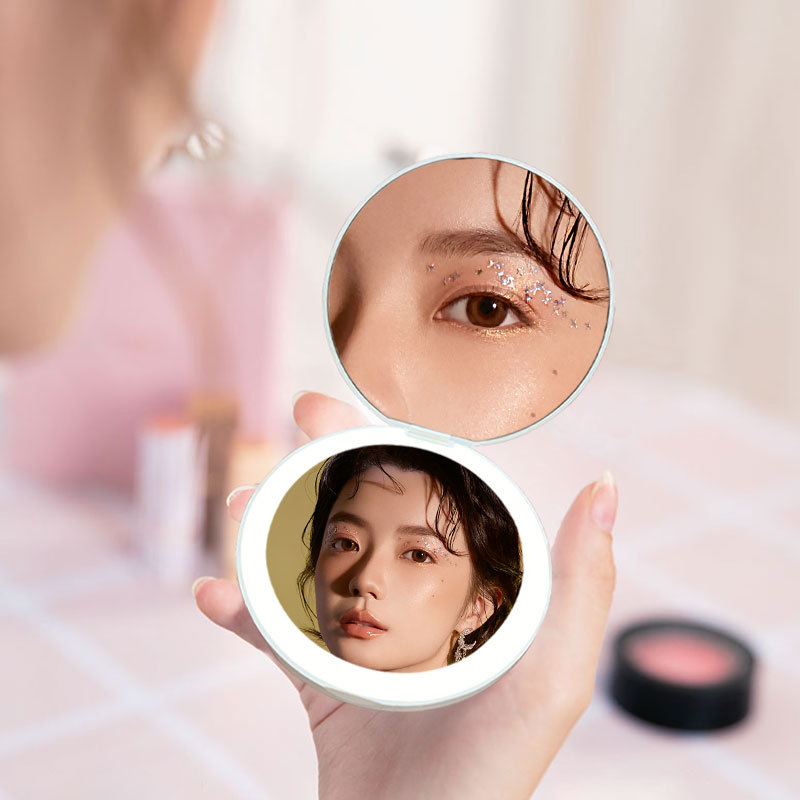 <a href="https://jojomirror.com/product/portable-lighted-compact-makeup-mirror-3/">Learn More </a>