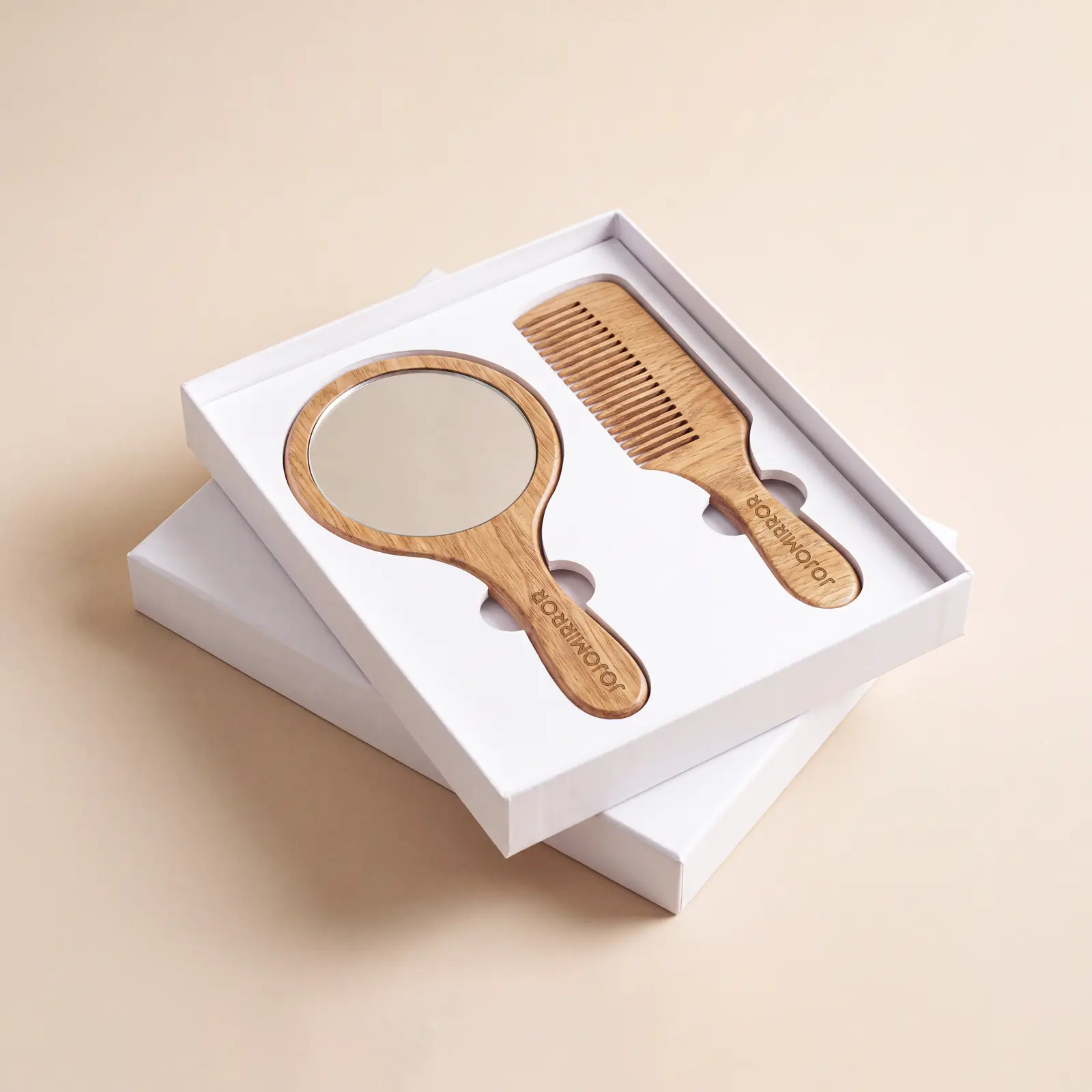 Wood-look hand mirror and comb presented in a white gift box